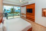 Master suite with ocean view and flat screen HDTV